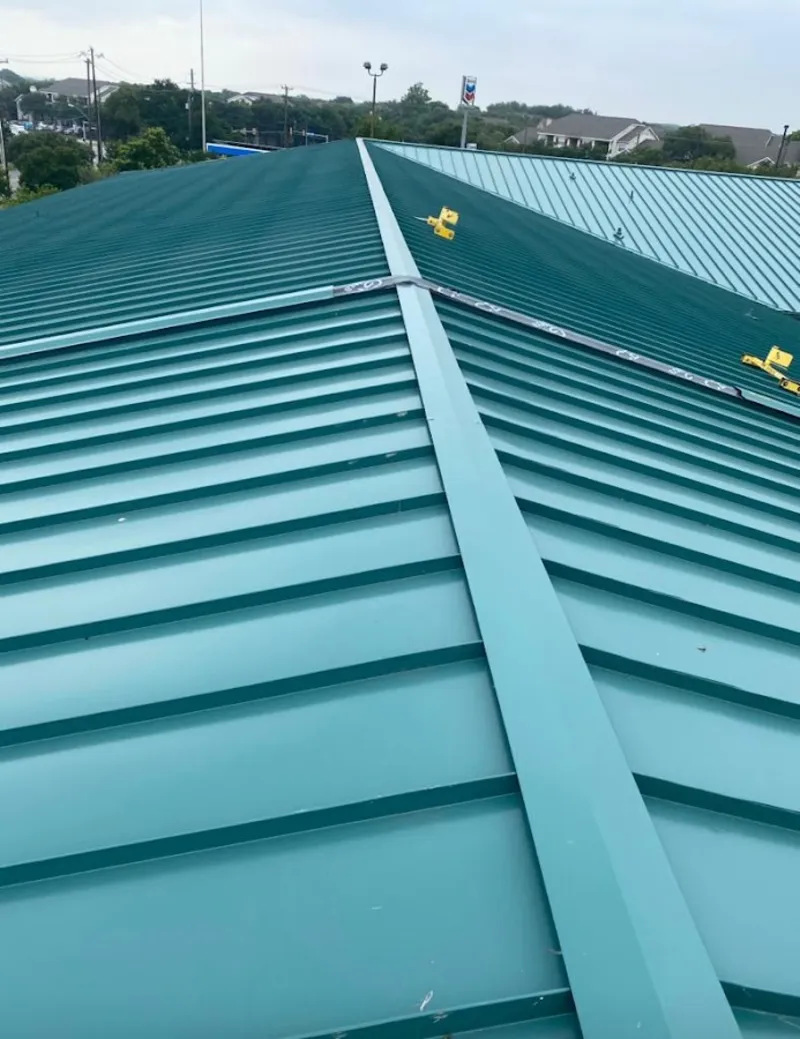 Green commercial metal roof ridge and valley for Metal Roof Repair in Delano